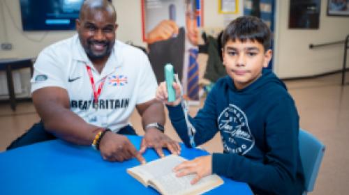 Kevin Brown and Boldmere Junior School pupil Akeem Sayed